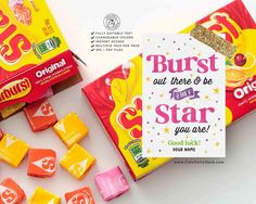 two boxes of starburst are next to each other on a white surface with an ad for them