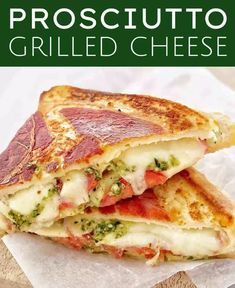 a grilled cheese sandwich with broccoli and tomatoes on it is stacked high