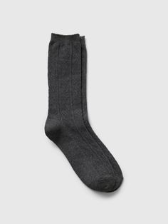 Soft, stretch cotton-blend sweater crew socks.  Ribbed top.  Reinforced toe and heel.  These socks are made with 18% recycled polyester.  Compared to virgin materials, using recycled materials helps to reduce resource use and waste.  This product was made in a factory that runs the Gap Inc.  P. A. C. E.  Personal Advancement & Career Enhancement) program.  P. A. C. E.  is our educational program that helps the women who make our clothes build the skills, knowledge, confidence & resilience needed to advance in work & life.  Learn more here.  S/M: 20 cm toe length, 26 cm leg length.  M/L: 22 cm toe length, 28 cm leg length. Warm Gray Casual Socks, Breathable Gray Socks, Functional Gray Sweat-resistant Socks, Comfortable Gray No-show Socks, Gray Non-slip Socks, Gap Sweater, Ribbed Top, Toddler Gifts, Crew Socks