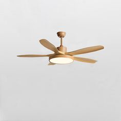 a ceiling fan with three wooden blades