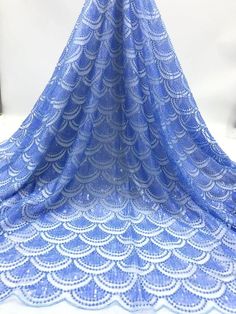 We offer a variety of fashion handmade fabric，those are widely use for wedding dress，garment and fashion cloth. we sell it by yard，our minimum order is 1 yards，and we always package it 15 yards for one roll，the width is about 125cm/45inch Material ： sequins ,beads ,mesh ，Rayon,polyester. Symmetrical embroidery floral pattern, with lovely flowers in the middle, scalloped border. You can also cut and use separately. Perfect for dress, tops, wedding veil. You can split the piece up and have one sca Lace Fabric Diy, Scalloped Border, Beaded Lace Fabric, Dress Tops, Fabric Diy, Wedding Dress Fabrics, Embroidery Floral, Handmade Fabric, Wedding Veil