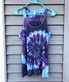 "| Tie Dye Racerback Tank Top | 💛 These tank tops are flowy, comfortable, and made with extremely soft material. Perfect for the gym, yoga, festivals or a nice summer day :) In the winter/fall this tank top looks perfect layered under a kimono, jean jacket or sweater. Features: - Merrowed bottom hem, Sheering at racer back seam. - Side seamed for a comfortable and relaxed drapey fit. - 65% Polyester, 35% viscose Measurements: Sizes--Length------Bust S---------19.25\"-----31.76\" M--------19.75\ Tie Dye Hippie, Hippie T Shirts, Tie Dye Women, Tie And Dye, Gym Yoga, Diy Shirt, Hippie Style, Racerback Tank Top, Festival Fashion