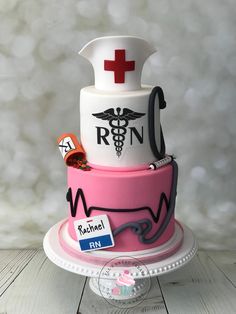 a cake decorated with medical symbols on top of a table