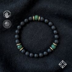 A grounding stone, Onyx is believed to absorb negative energies, alleviates worries and tensions, and eliminates confusion. It helps in being structured and letting go of unhappy thoughts. There is 1 accent Jade bead, which is repeated 3 times for Balance. A protective stone. It keeps the wearer from harm, brings harmony, and is a symbol of serenity and purity. Jade soothes the mind and releases negative thoughts. This bracelet has an elastic band that stretches over the wrist. Sizing and fit ma Men’s Stone Bracelet, Bracelet Mens, Mens Bracelet Beads, Mens Bead Bracelet, Stone Bracelet For Men, Bracelet Stone Beads, Male Beaded Bracelets, Mens Beaded Jewelry, Men’s Beaded Bracelet