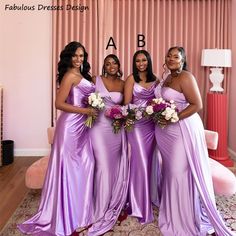 the bridesmaids are all wearing purple dresses