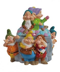 a group of gnome figurines sitting next to each other