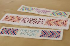 three handmade bookmarks with words on them that say, put up i'm reading and one more page