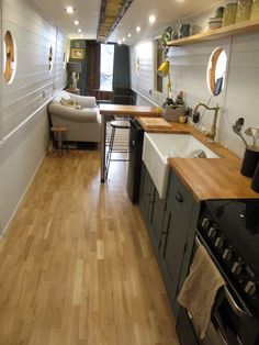 the kitchen is clean and ready to be used as a living room or dining area