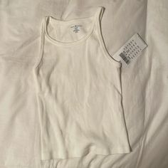 Ribbed Racer Back Tank Top From Brandy Melville In Natural White Color Fitted White Tank Top For Everyday, White Fitted Basic Tank Top, Basic White Fitted Tank Top, Fitted White Basic Tank Top, Ribbed Racerback Tank Top, Brandy Melville Tank Top, Brandy Melville Tank, Red Crop Top, Muscle Tank Tops