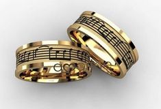 two wedding bands with musical notes on them