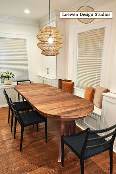 a large wooden table sitting in the middle of a room