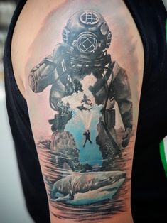 a man with a diving suit on his arm