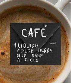 a cup of coffee with an envelope in it that says cafe 1 liquido color tiera que sabe a cielo