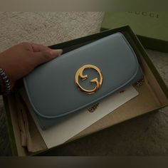 Brand New Gucci Blondie Continental Chain Wallet - 100% Authentic - Color Light Blue Leather - Comes With A Box . Dust Bag, And Authentic Details Light Blue Leather Shiny Gold-Toned Hardware Moir Lining Round Interlocking G Inside: 12 Card Slots And 2 Bill Compartments, Two Separate Interior Compartments And Zip Coin Pocket Chain Strap With 23.6" Drop Button Closure 8.3"W X 4.1"H Made In Italy Elegant Gucci Wallet On Chain As Gift, Gucci Gold Rectangular Wallet On Chain, Gucci Gold Wallet On Chain For Everyday Use, Gucci Gold Wallet On Chain With Chain Strap, Gucci Gold Wallet On Chain For Evening, Gucci Gold Wallet On Chain With Gold-tone Hardware, Gold Gucci Wallet On Chain For Evening, Chic Gucci Gold Wallet On Chain, Chic Gold Gucci Wallet On Chain