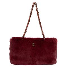 Chanel burgundy rabbit fur shoulder tote with chain straps. Shoulder drop 10". Collection 2000/2002. Comes with hologram and original dust cover. Fur Bags, Fur Bag, Rabbit Fur, Dust Cover, Shoulder Tote, Fashion Handbags, Chain Strap, Chanel, Shoulder Bag