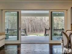 an open living room with sliding glass doors