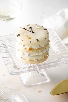 a stack of cookies sitting on top of a glass plate