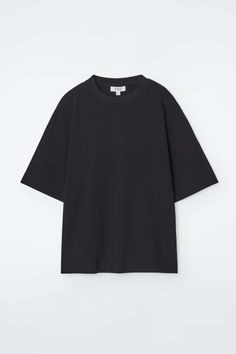 OVERSIZED T-SHIRT - Black - Tops - COS Basic Oversized Crew Neck T-shirt, Oversized Solid Crew Neck T-shirt, Solid Color Boxy Fit T-shirt With Drop Shoulder, Solid Color Boxy Fit Drop Shoulder T-shirt, Oversized Solid Color T-shirt For Everyday, Simple Oversized T-shirt, Basic Tops With Ribbed Neckline For Streetwear, Oversized Basic Crew Neck T-shirt, Classic Oversized Tops For Everyday