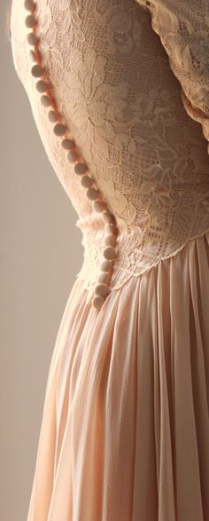 Super gorgeous vintage 60s silk and lace pink peach dress. Lace bodice, long and slightly puffed sleeves. Fluffy and asymmetrical silk skirt. Row of buttons silk covered on the back. Zip on the back. Fully lined Tailored Excellent vintage conditions Estimate size XS/S Model's size 6 uk, h 163 cm Peach Wedding Dress, 90s Calvin Klein, Calvin Klein Black Dress, Silk And Lace, Peach Dress, Vintage Gowns, Peach Wedding, Special Dresses, Chantilly Lace