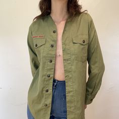 70s long sleeve green boy scout button down no noticeable flaws besides patches being removed  pit to pit: 20in shoulders: 19in sleeve: 22.5in length: 26in Military Style Cotton Tops With Snap Buttons, Khaki Shirt With Snap Buttons For Fall, Olive Military Style Tops For Fall, Fall Khaki Shirt With Snap Buttons, Green Military Style Button-up Shirt, Olive Military Style Button-up Top, Vintage Olive Long Sleeve Tops, Military Style Button-up Tops For Fall, Military Style Shirt With Button Closure For Fall