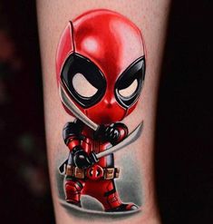 a deadpool tattoo on the leg of a person with a knife in his hand