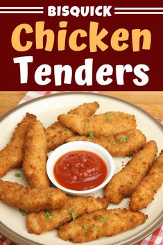 some fried food on a plate with ketchup and dipping sauce in the middle