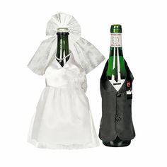 two bottles of wine are dressed up to look like the bride's dress and groom's tuxedo