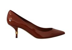 Step into luxury with these Dolce & Gabbana patent leather heels pumps. Gorgeous and brand new with tags, they exude sophistication and are sure to add a touch of elegance to any outfit. Handcrafted with high-quality materials, they promise comfort and style. They are perfect for any occasion that calls for a chic and polished look.
Color: Brown
Material: Leather
Sole: Leather
Logo details
Country of origin: IT
Made in Italy Brown Kitten Heels, Brown Kitten, Brown Pumps, Kitten Heel Shoes, Dolce Gabbana Shoes, Patent Leather Shoes, Kitten Heel Pumps, Brown Heels, Patent Leather Heels