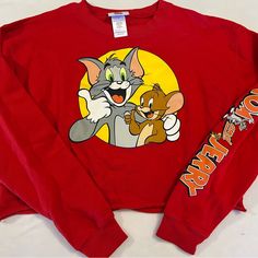 M New Tom & Jerry Women's Long Sleeve Shirt Top Graphic Sweatshirt Red Sweater New Without Tags Retro Red Long Sleeve T-shirt, Fun Yellow Tops For Fall, Fun Yellow Fall Tops, Fun Red Tops For Fall, Fun Red Cotton Tops, Retro Red Long Sleeve Top, Red Retro Long Sleeve Top, Fun Red Crew Neck Tops, Red Crew Neck Tops Casual Style