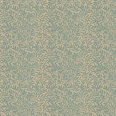 a blue and beige wallpaper with leaves on it