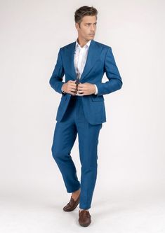 The Hudson Marine Blue Linen Suit is the perfect expression of summer luxury. Crafted from 100% linen in a vibrant marine blue hue, this custom suit will make an elegant statement wherever you wear it. Perfect for hot summer days, its lightweight fabric will keep you looking sharp while feeling cool and comfortable. Blue Linen Suit For Work, Blue Linen Suit For Workwear, Summer Linen Business Suits, Elegant Blue Summer Suits, Luxury Tailored Suits For Summer, Blue Linen Business Blazer, Blue Linen Blazer For Business, Luxury Tailored Summer Suits, Blue Linen Blazer For Semi-formal Occasions