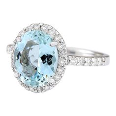 Stamped: 14K White Gold Total Ring Weight: 3.7 Grams Ring Length: N/ARing Width: N/A Gemstone Weight: Total Natural Aquamarine Weight is 3.01 Carat (Measures: 11.00x8.90 mm) Color: Blue Diamond Weight: Total Natural Diamond Weight is 0.60 Carat Quantity: 34 Color: F-G, Clarity: VS2-SI1 Face Measures: 13.60x11.50 mm Sku: [703797W] Wedding Platinum Gemstones With Halo Setting, Platinum Gemstones With Halo Setting For Wedding, Luxury Topaz Ring With Halo Design For Formal Occasions, Formal Blue Topaz Ring With Halo Setting, Formal White Gold Topaz Ring With Halo, Luxury Topaz Ring With Halo Design For Anniversary, Luxury Topaz Halo Ring For Anniversary, Formal Blue Topaz Diamond Ring With Halo Design, Oval Gemstones With Halo Setting For Wedding