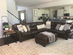 a living room filled with lots of furniture