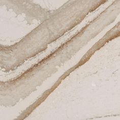 an abstract marble pattern with white and brown colors