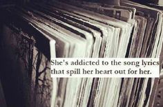 a stack of records with the words she's added to the song lyrics that spill her heart out for her