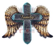 a cross with wings and the word family on it