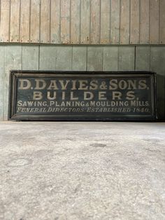 a sign on the side of a building that says d davis & sons builder's