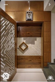 an open door leading to a bathroom with wood paneling