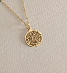 14K Real Solid Gold Mandala gold necklace ● Material of pendant: Solid Gold 14k ( REAL GOLD ) ● Metal Stamp: 14L ( REAL GOLD ) ● The pendant is available in 6 sizes: - 14,0 mm / 0,55 inches ( Diameter ) In the photos - 15,3 mm / 0.60 inches ( Diameter ) - 16,5 mm / 0,65 inches ( Diameter ) - 19,1 mm / 0,75 inches ( Diameter ) - 21 mm / 0,82 inches ( Diameter ) - 23 mm / 0.90 inches ( Diameter ) ( In the photos the size is 14mm / 0.55 inches Diameter ) ( Jump Ring inner diameter: 4 mm ) ● Materia Cheap Spiritual Yellow Gold Jewelry, Gold Necklaces With Intricate Design For Anniversary, 14k Gold Filled Yellow Gold Charm Necklace For Anniversary, Gold Necklace With Intricate Design For Anniversary, Intricate Gold Necklace For Anniversary, 14k Gold Medallion Amulet Jewelry, Yellow Gold Charm Necklace With Coin Pendant, White Gold Recycled Gold Pendant Necklace, Gold Charm Necklace With Round Pendant For Gift