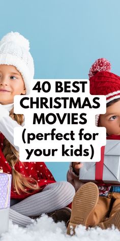 two children sitting in the snow with presents on their lap and text overlay that says 40 best christmas movies perfect for your kids