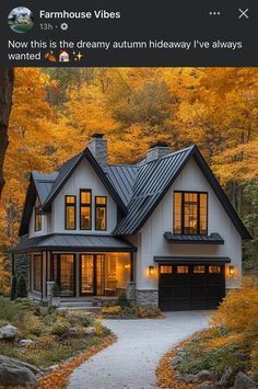 an image of a house in the fall with leaves on the ground and trees around it