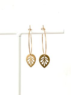 Lovingly made earrings made of stainless steel with brass pendant. Motif: Sheet Material: - The Creole is made of stainless steel & is clamped for closing.  According to the manufacturer, cadmium-, lead- and nickel-free. - The pendant is made of brass - Size: 25 mm the creole, about 38 mm the complete earring Other colors and motifs available. The jewelry is new and not worn. ♥ ♥ ♥ Made with a lot of love. ♥ ♥ ♥ Unevenness, created in the manufacturing process, underlines the individuality of th Perfume Cream, Plug Earrings, Plugs Earrings, Earrings Ear, Leaf Pendant, Brass Pendant, Jewelry Earrings Hoops, Manufacturing Process, Ear Studs