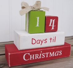 three blocks stacked on top of each other with the words 11 days till christmas written on them