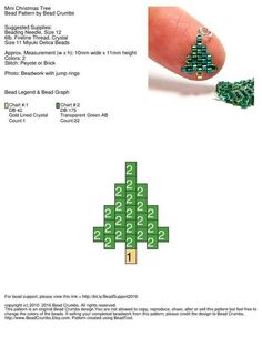 a christmas tree made out of legos on top of a sheet of white paper