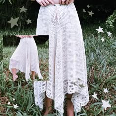 a woman standing in the grass with her hands on her hips wearing a white crochet skirt