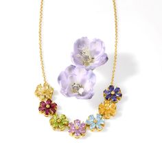 Ross-Simons - 6.90ct t. w. Multi-Gemstone Flower Necklace Over Sterling. 16". This gorgeous flower necklace presents seven bright blooms glowing in an array of vivid jewel tones. Features 6.90 ct. tot. gem wt. amethyst, citrine, iolite, peridot, lemon quartz, rhodolite garnet and sky blue topaz. Set in polished 18kt yellow gold over sterling silver. Stationed on a cable chain with a 2" extender. Springring clasp, multi-gemstone flower necklace. Yellow Gold Flower Shaped Gemstone Necklace, Yellow Gold Flower Necklace With Gemstone, Sky Blue Topaz, Sterling Jewelry, Rhodolite Garnet, Gemstone Jewellery, Lemon Quartz, Multi Stone, Jewel Tones