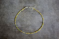 ✦ INFORMATION ✦ Choker with 2 mm yellow mix glass seed beads.  There are 3 sizes available: 32 - 39 cm (7 cm extended chain) 34 - 41 cm (7 cm extended chain) 36 - 43 cm (7 cm extended chain) ✦ CUSTOM ORDER ✦ Would you like another length, charm, color or something totally else? No problem! Just message me with all of your wishes and we will work it out. ✦ SHIPPING & PACKAGING ✦ The items will be send 1-5 days after payment. The package will be send from the Amsterdam, The Netherlands. It depends on where you live how long it will take to get to you. Please allow 4-5 weeks for your order to arrive. If it's over the 4 weeks and your item didn't arrive, please contact me! Please remember, I do not control the post offices. Your package might get stuck in customs for 1-2 weeks. I understand th Yellow Faceted Bead Necklaces For The Beach, Yellow Tiny Beads For Gifts, Yellow Faceted Beads Necklace For Beach, Choker Jewelry, Shipping Packaging, Bohemian Beach, Jewelry Choker, Silver Plated Jewelry, Beaded Choker