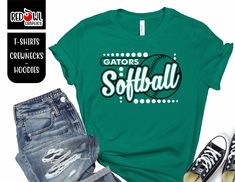 Personalized Softball School Spirit T-Shirt Crewneck, Hoodie Hooded Sweatshirt Football, Baseball, Basketball, Softball, Track, Volleyball, Cross Country, Cheer, Wrestling Not all colors are available in all sizes and styles.  Please check the color and size charts in photos. We do our best to accurately represent shirt colors by using actual photos but do understand that all monitors will display differently. Please contact us prior to purchase with any questions on sizing or colors. Your purchase includes a custom imprint created specifically for your team! A product proof will be emailed to you within 1 business day.  Please keep an eye on your Etsy messages and reply with any changes within 24 hours. Your order will be sent to production after that time if no response is received. Exce Green Tops For Baseball Season, High School Softball Shirts, Casual Green Sublimation T-shirt With Team Name, Softball And Dogs Shirt, Gators Softball, Softball Sweatshirt, Represent Shirt, Florida Gators Hoodie, Vintage Florida Gators Sweatshirt