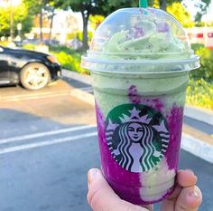 a starbucks drink with whipped cream and sprinkles