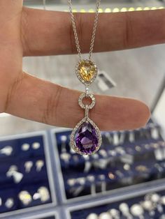 Metal————-14k White Gold Diamond weight———0.50CTDiamond quality———VS2Diamond Color————GGemstone weight———3.00CT (Amethyst & Citrine)Pendant Length.....1.1/2 inches All Natural StoneNecklace——-Handmade in USA Available chain ...16, 18, 20 inches long Elegant Multi-stone Drop Necklaces, Formal Multi-stone Drop Jewelry, Multi-stone Drop Jewelry For Anniversary, Gold Drop Necklace, Halo Diamond Earrings, Diamond Wedding Sets, Citrine Pendant, Natural Stones Necklace, Yellow Citrine